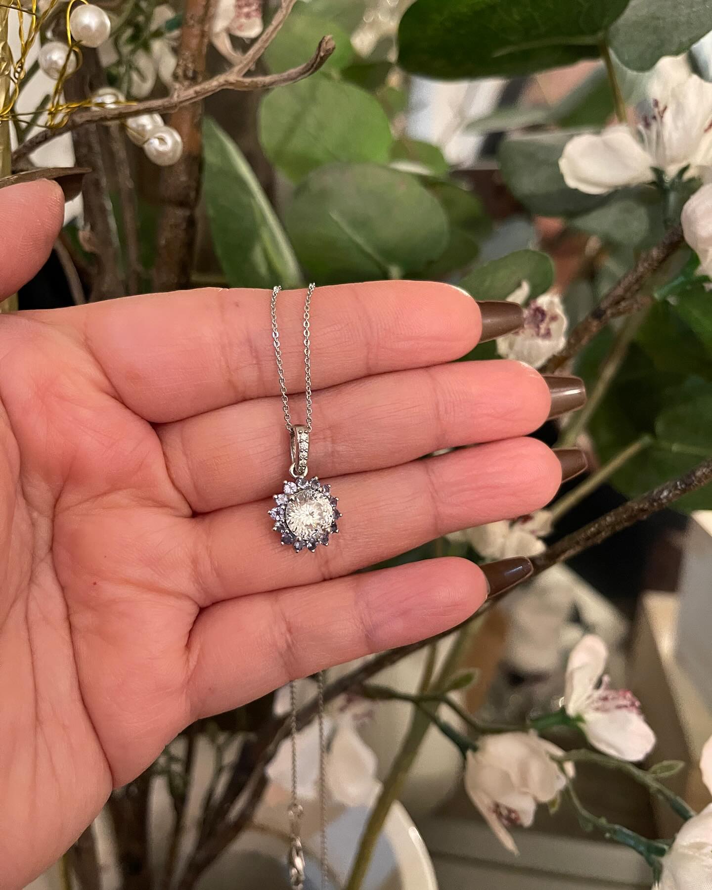 AD | shoplctv 

This moissanite flower pendant showcases delicate petals formed from vivid tanzanite