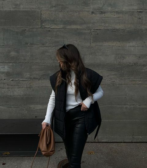 This black puffer vest has become my favorite item in this seasons wardrobe. shopandraofficial just 