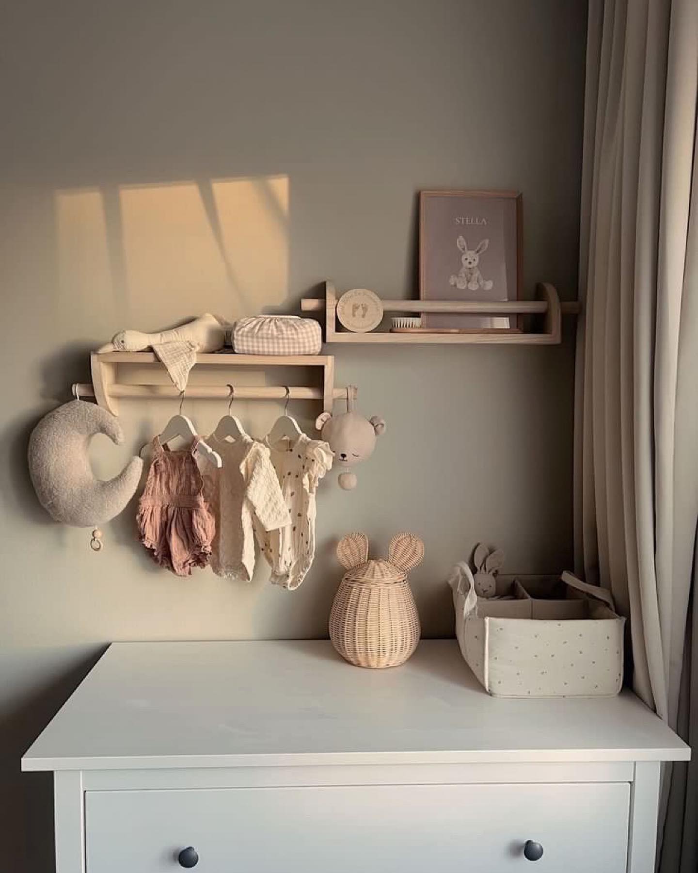 Such a beautiful nursery with all of the small details, calming colors & of course with the addition