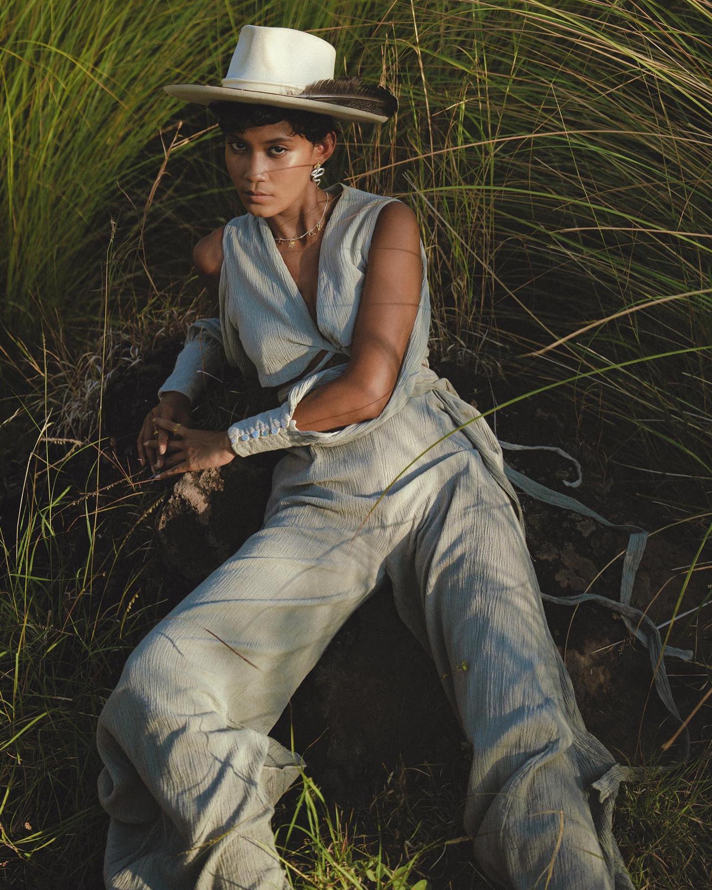 This ready-to-wear, super-comfortable set features a wrap top with charming open sleeves adorned wit