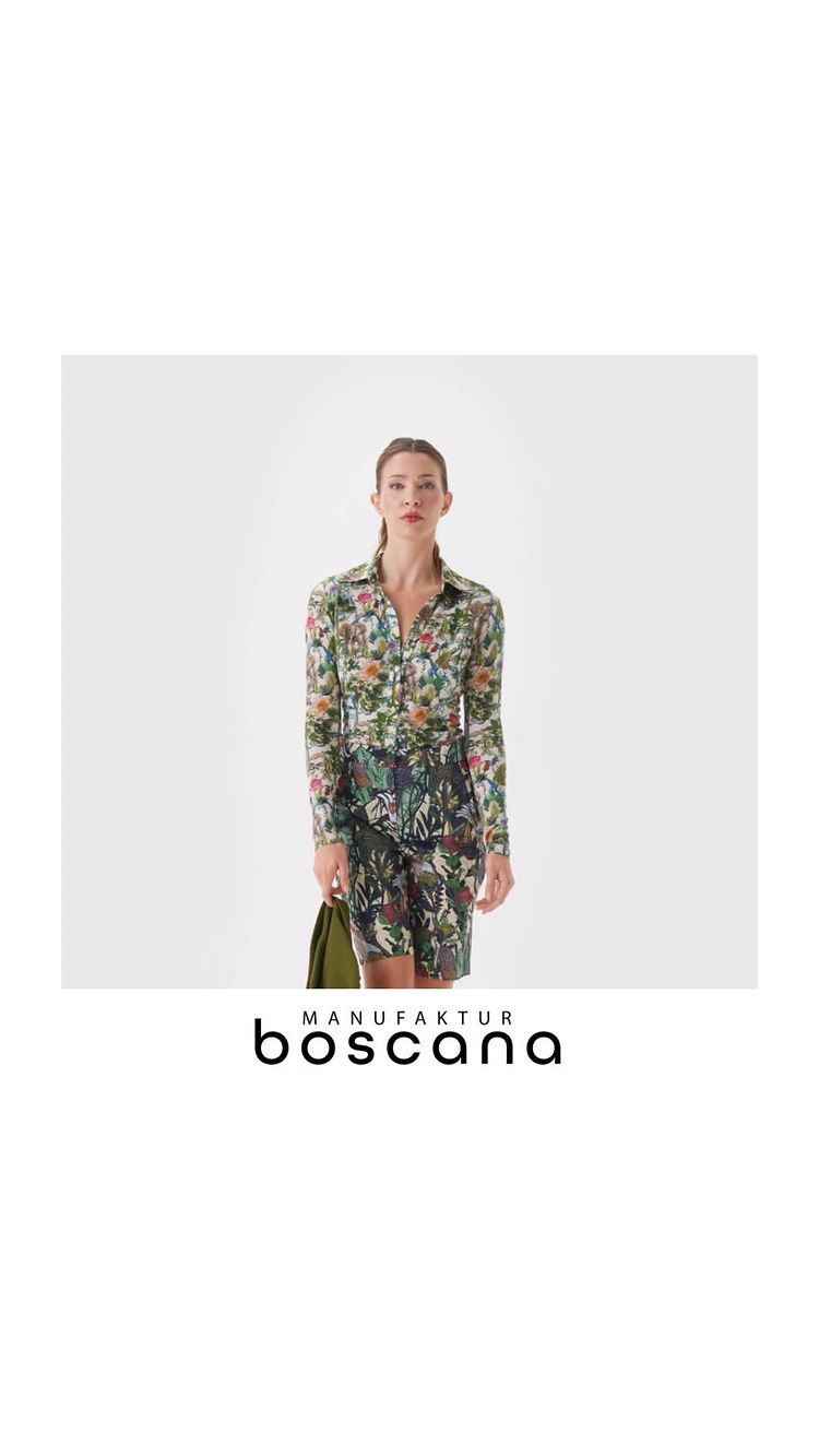 ✨ Erlebe die Perfektion! ✨ 

Unsere grüne Bluse von Manufaktur Boscana besticht durch ihre schmale, 