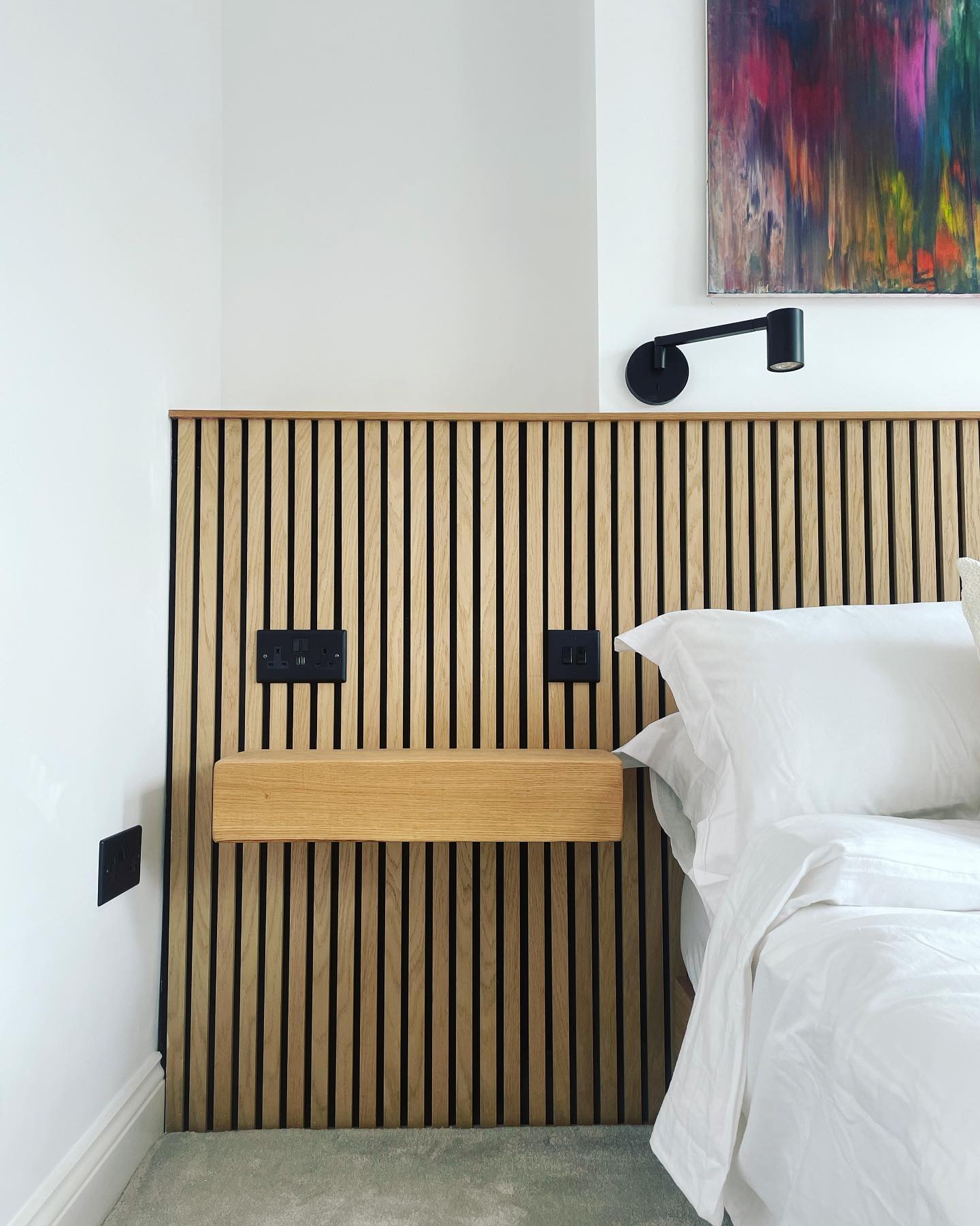 We have a bedroom 🥳

We wanted a really minimal room but a pop of colour from some kind of artwork.