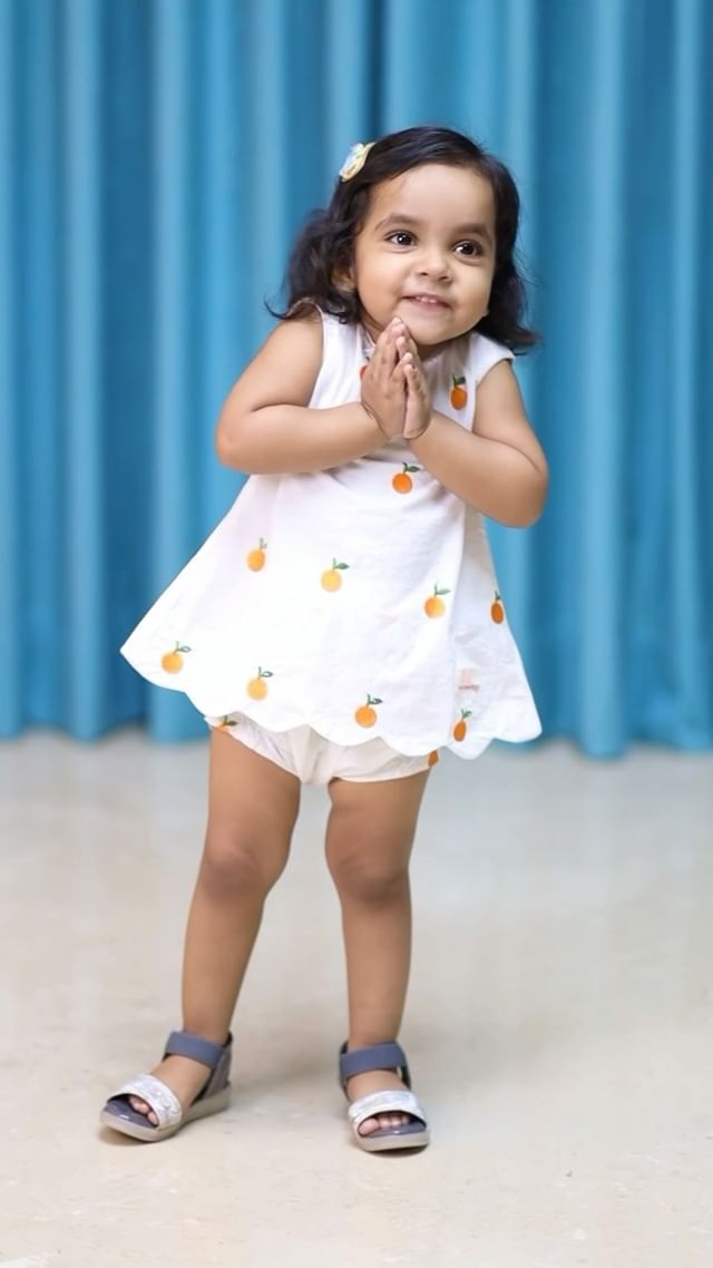 Embrace sunny days with this juicy delight! 🍊💛 This beautiful white top and shorts set, adorned wi