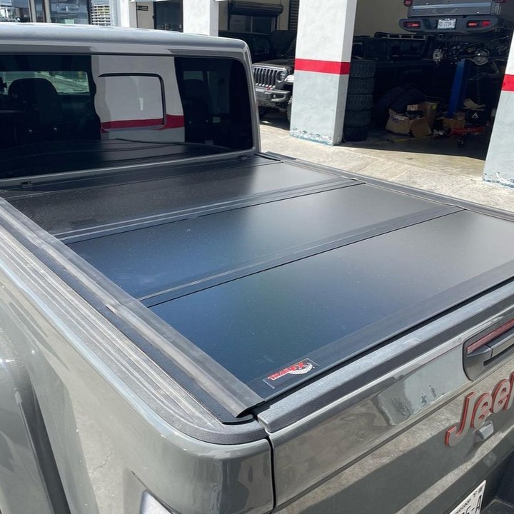 Jeep Gladiator with #TrailFX Premium Hard Tonneau Cover

Save up to $50 with TrailFX's tonneau cover